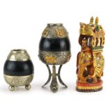 Two South American Bombilla cups with white metal mounts and an Indian carved wood elephant consort,