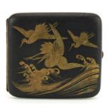 Japanese Komai style cigarette case engraved with birds of paradise amongst flowers, 9cm wide For