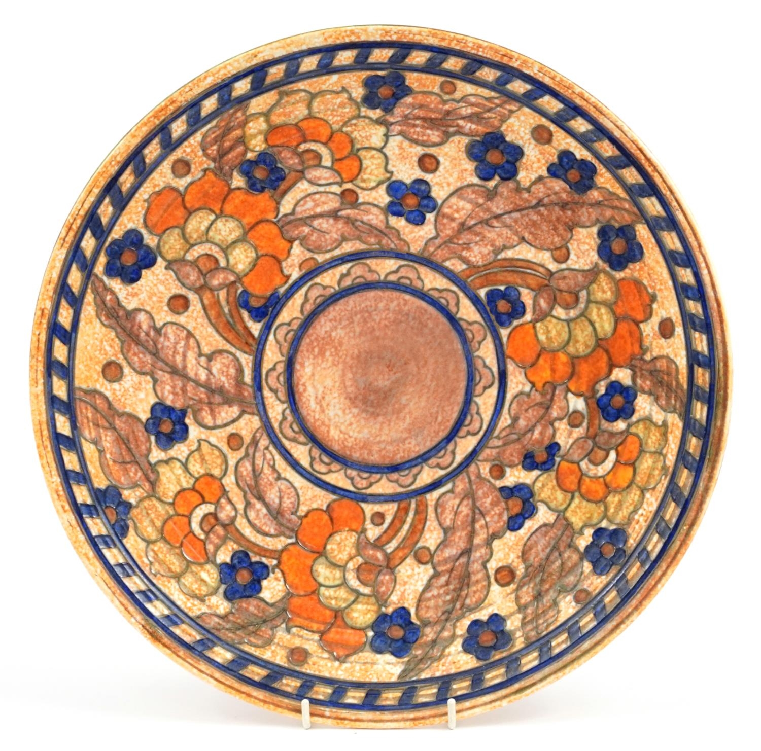 Charlotte Rhead for Crown Ducal, Art Deco charger hand painted with stylised flowers, 36.5cm in