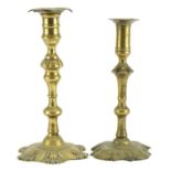 Two 18th century brass candlesticks, the largest 25cm high For further information on this lot