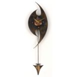 Arts & Crafts style wall clock in the manner of Sam Fanaroff, 42cm high For further information on