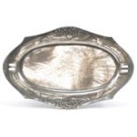 German Art Nouveau pewter serving tray with twin handles decorated in low relief with stylised