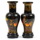 Pair of Chinese lacquered yen yen vases on stands, each gilded with goldfish amongst aquatic life,