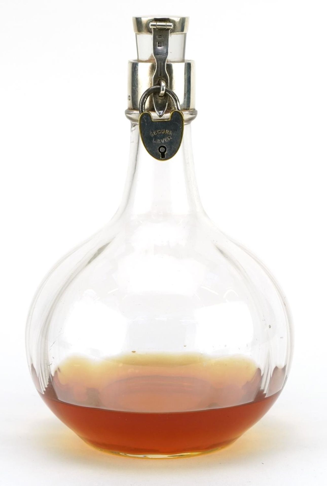 Hukin & Heath Ltd, Victorian glass decanter with silver mounts and padlock, registered design