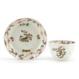 18th century English tea bowl and saucer hand painted with flowers, the tea bowl 8.5cm in diameter