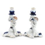 Cestar Lucru Manual, pair of Romanian porcelain figural candlesticks, each 15.5cm high For further