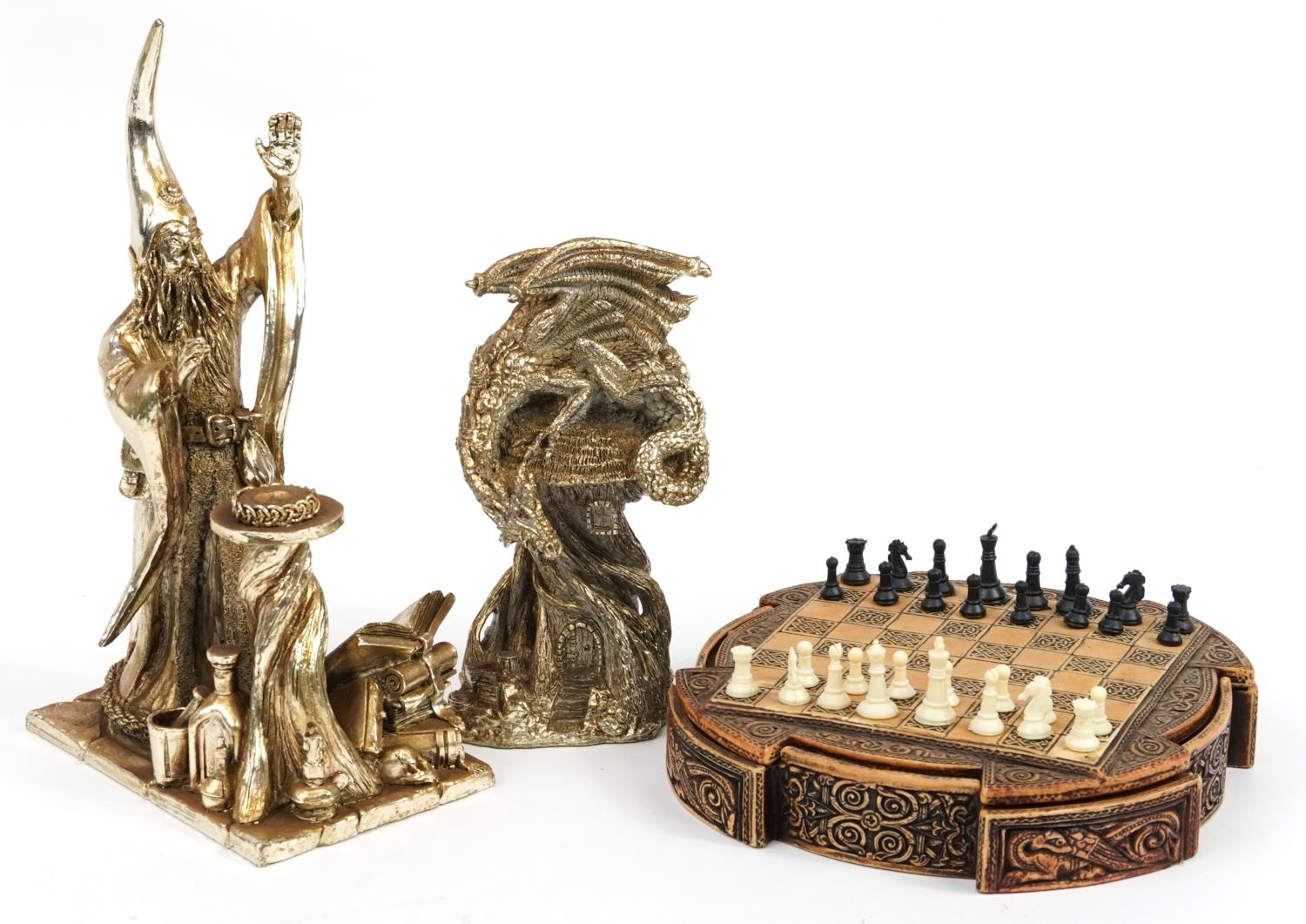 Celtic design chess board with pieces and two silvered Myth & Magic style figures, the largest