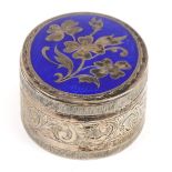 Oval unmarked silver and blue enamel trinket box with hinged lid and mirrored interior, 5.2cm