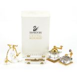 Four Swarovski Crystal Memories miniatures comprising Penny Farthing, gramophone, coffee grinder and