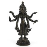 Chino Tibetan patinated bronze figure of standing Buddha, 21cm high For further information on