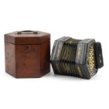 Victorian ebonised thirty two button concertina with pierced metal end plates and velvet lined case,