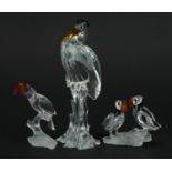 Three Swarovski Crystal birds comprising heron, pair of puffins and toucan, the largest 15cm high