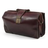 Mid 20th century leather doctor's bag with combination lock, 43cm wide For further information on