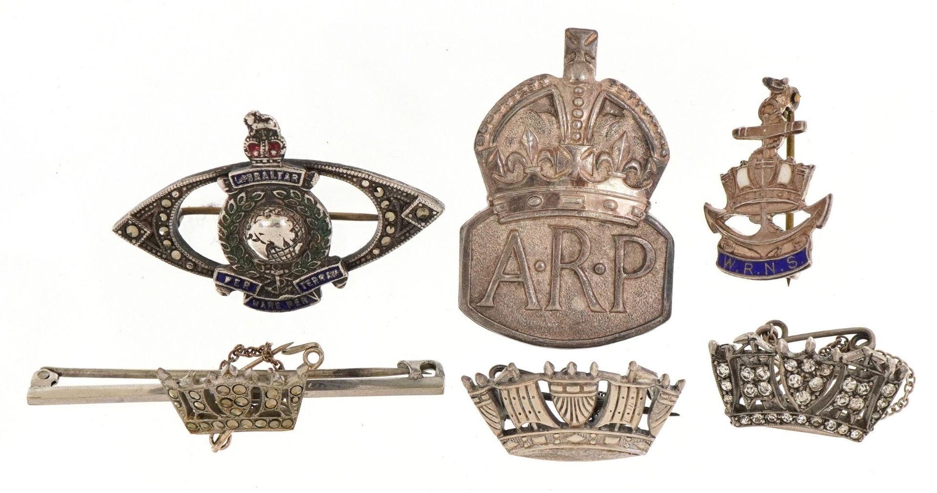 Five silver military interest sweetheart brooches and a silver ARP badge, some enamelled, the