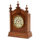 Ansonia Clock Co oak cased mantle clock striking on a gong, 41cm high For further information on