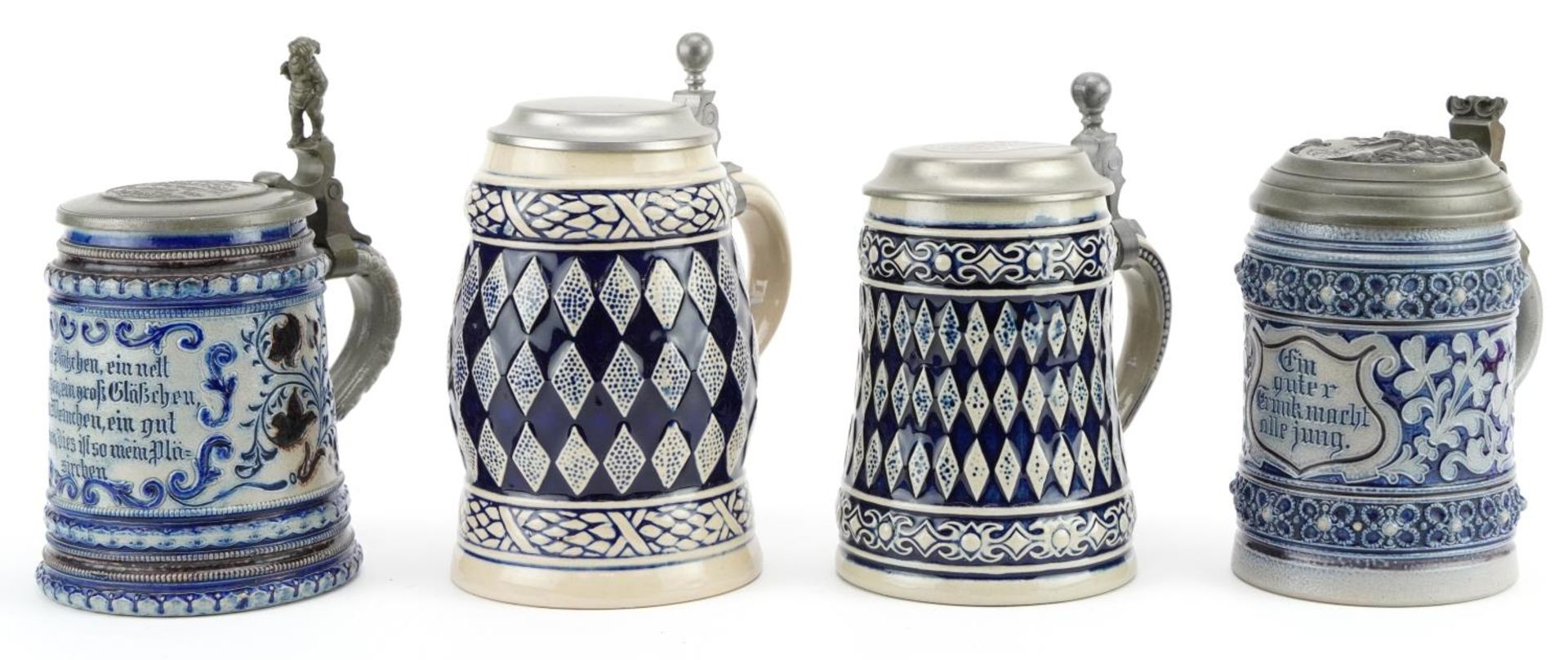 Four German salt glazed steins with pewter hinged lids, 18cm high For further information on this