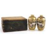 Pair of Japanese Satsuma pottery vases housed in a silk lined fitted case, each hand painted with