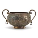 Anglo Indian unmarked silver twin handled sugar bowl profusely embossed with figures praying, 13cm