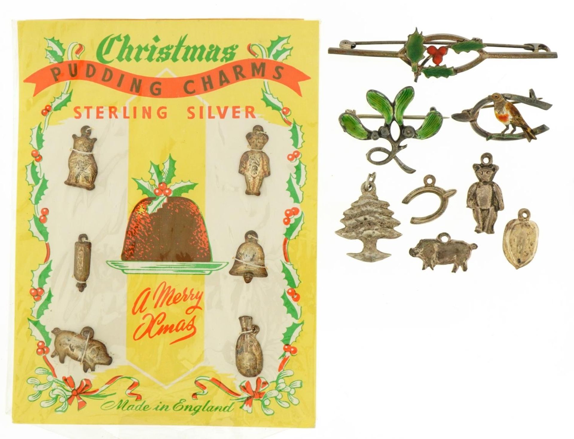 Silver Christmas related charms and brooches including set of six Christmas pudding charms and three