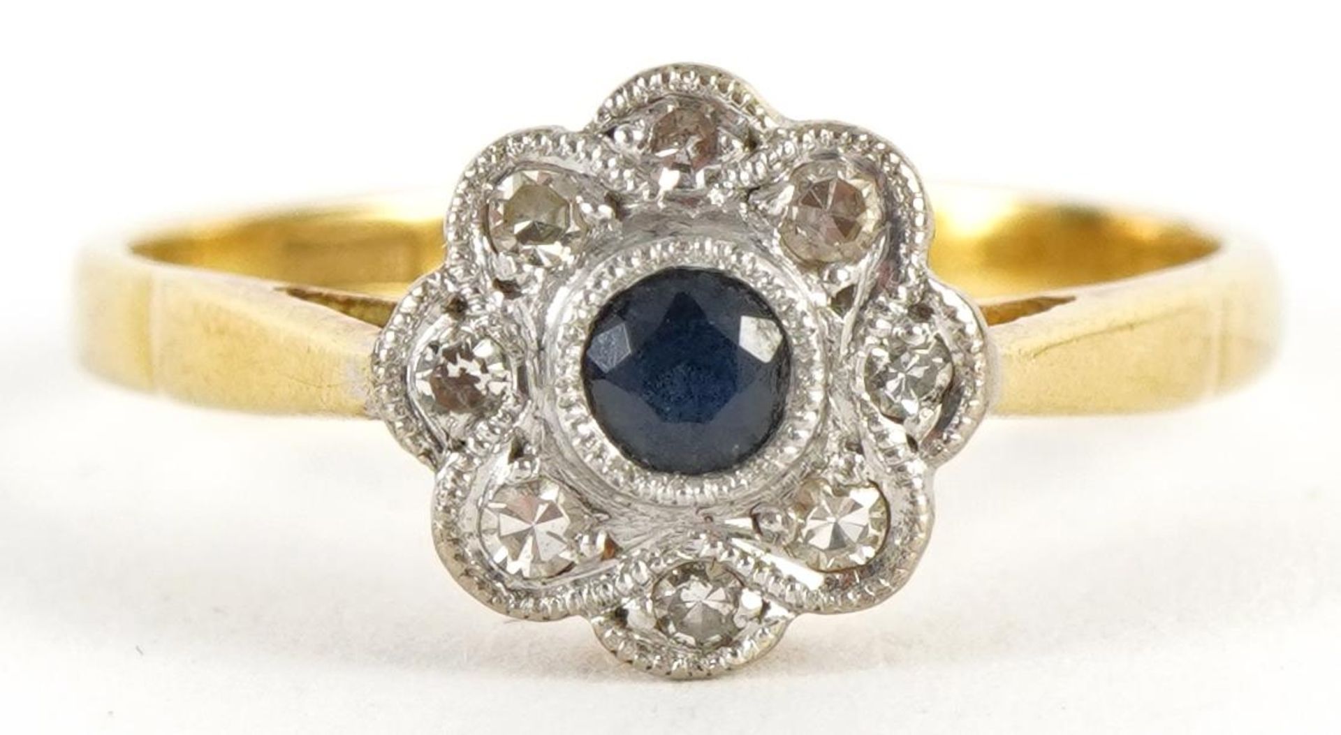 Art Deco 18ct gold and platinum sapphire and diamond flower head ring housed in a William