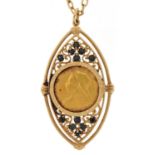 Queen Victoria 1900 gold sovereign housed in a pendant mount set with sapphires on a 9ct gold