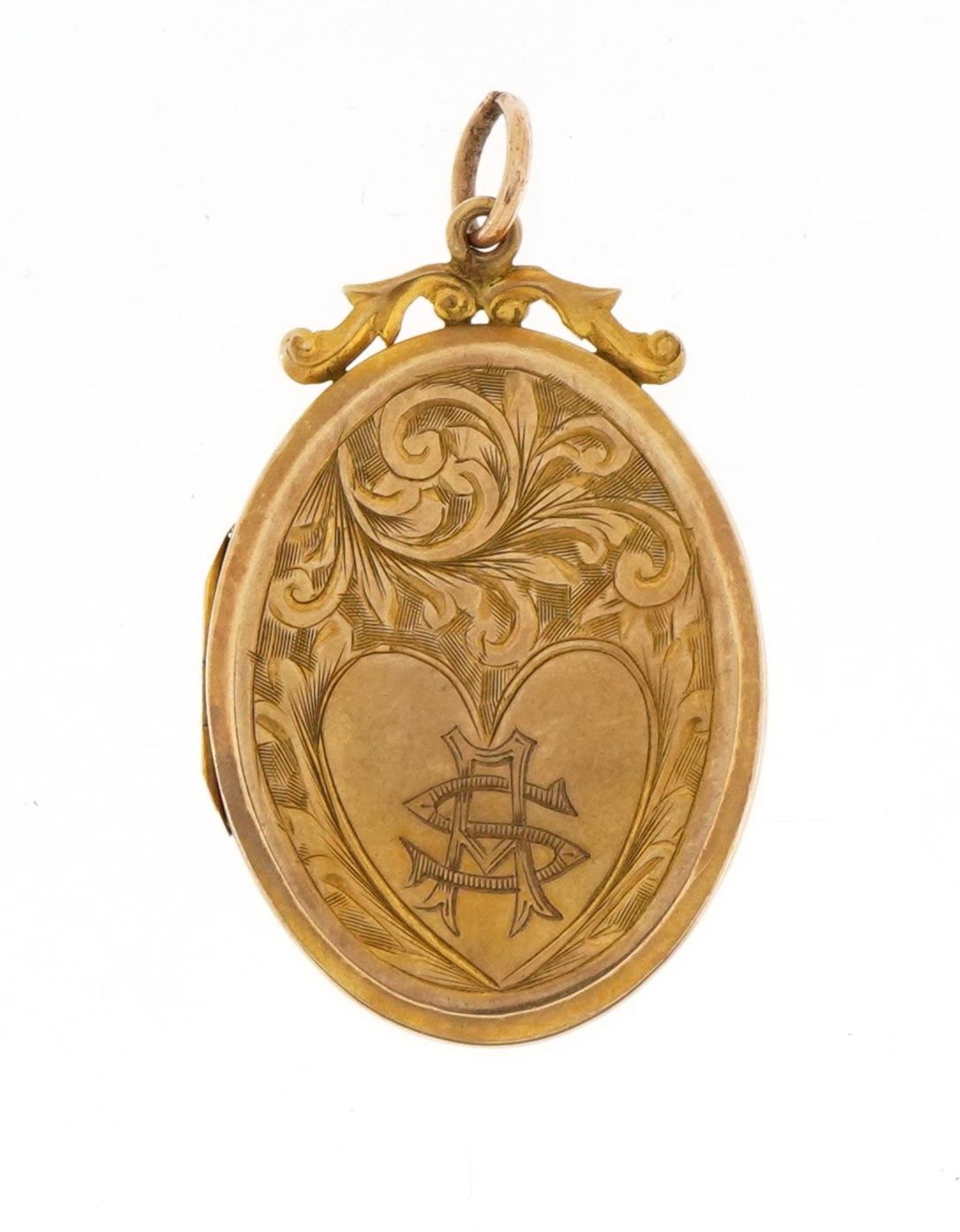 9ct gold back and front oval locket with engraved decoration, 3.4cm high, 4.8g : For further