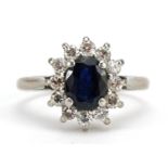 18ct white gold and platinum sapphire and diamond cluster ring, the sapphire approximately 6.8mm x