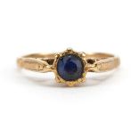 9ct gold sapphire solitaire ring housed in a silk and velvet lined box, the sapphire approximately