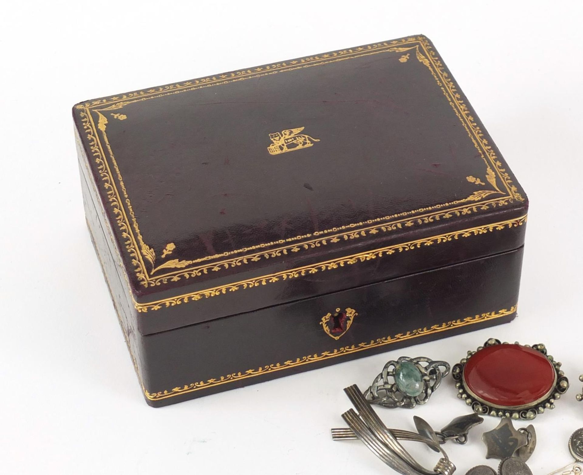 Silver and white metal jewellery housed in a Victorian tooled leather box, including brooches, rings - Image 2 of 10