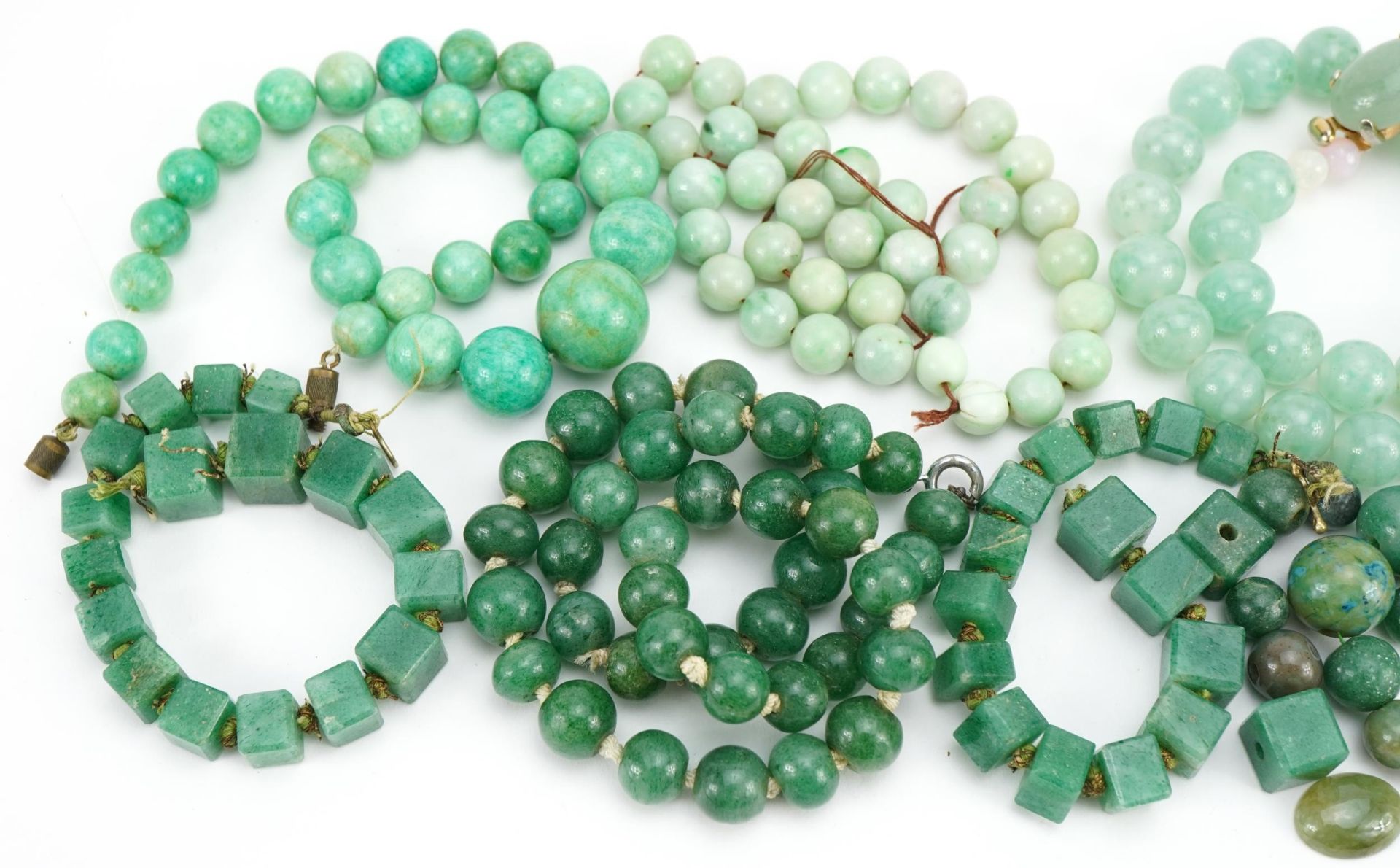 Four Chinese green jade bead necklaces and a collection of loose beads, total weight 350.0g : For - Image 2 of 3