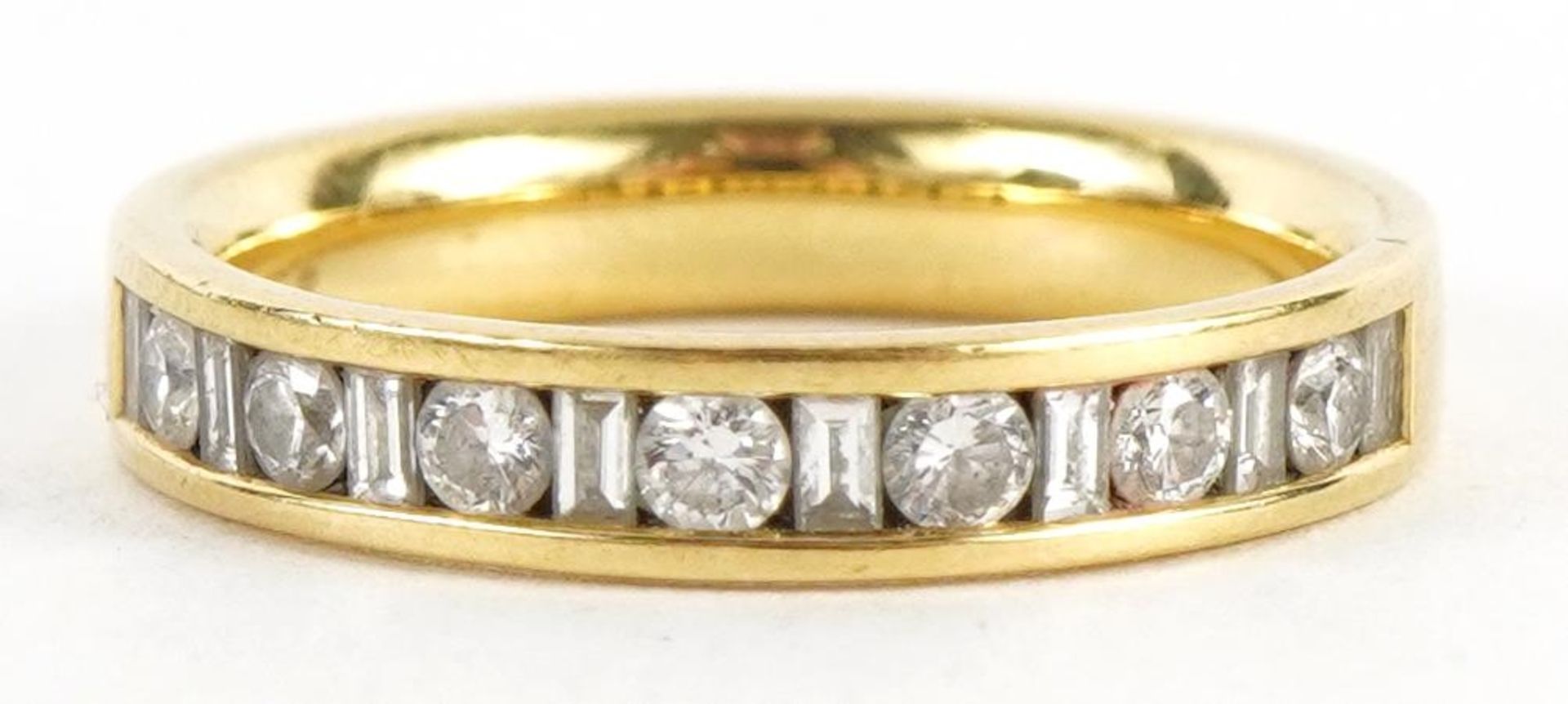 18ct gold diamond half eternity ring housed in a W Bruford tooled leather box, size L/M, 4.2g :