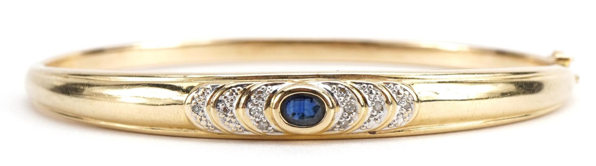 14ct gold sapphire and diamond hinged bangle, 6.3cm wide, 10.5g : For further information on this