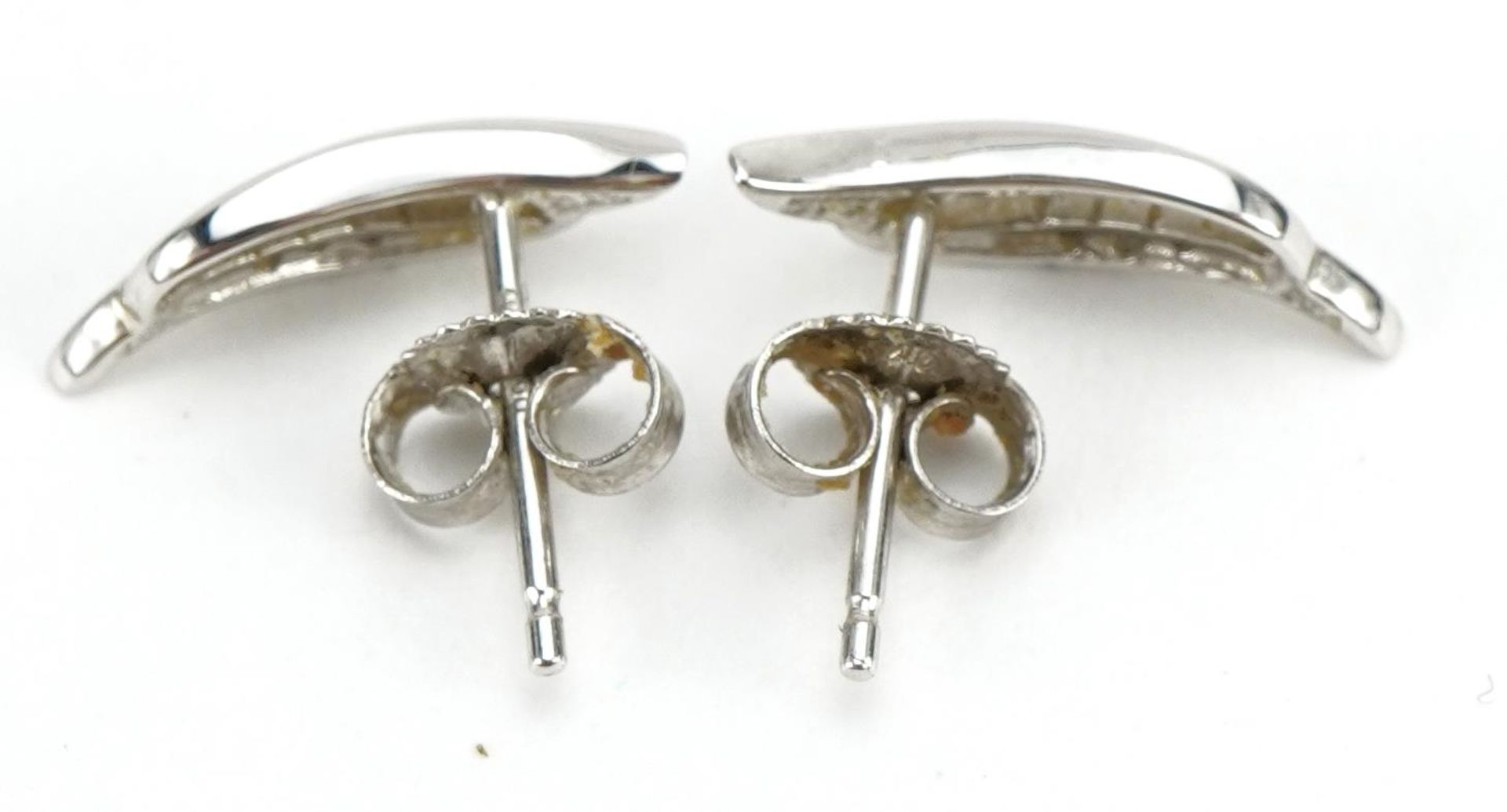 Pair of 9ct white gold diamond stud earrings, 1.4cm high, 1.2g : For further information on this lot - Image 2 of 2