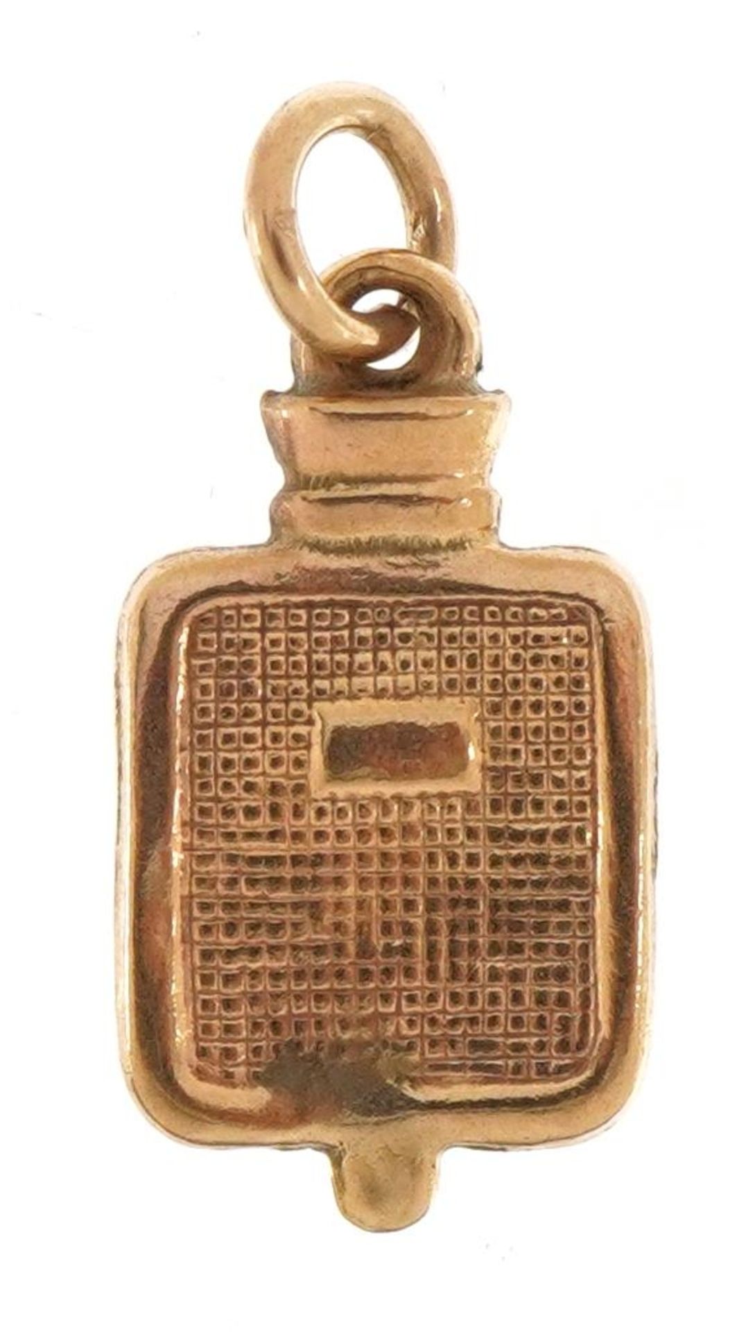 Unmarked 9ct gold hot water bottle charm, 1.6cm high, 0.4g : For further information on this lot