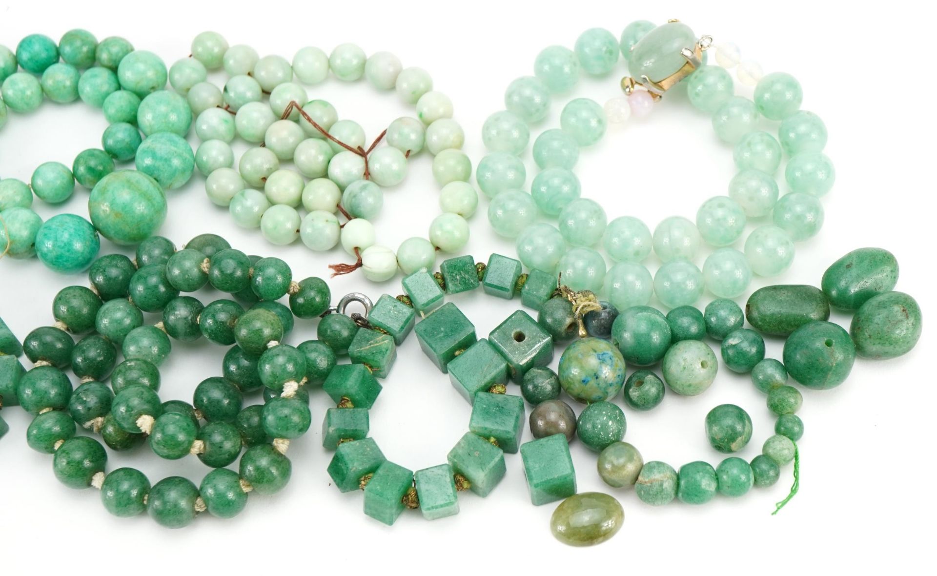 Four Chinese green jade bead necklaces and a collection of loose beads, total weight 350.0g : For - Image 3 of 3