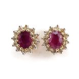 Pair of 9ct gold ruby and diamond two tier cluster stud earrings, 8mm high, 1.6g : For further