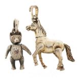 Two silver teddy bear and horse pendants with articulated limbs, the largest 4cm high, total 12.6g :