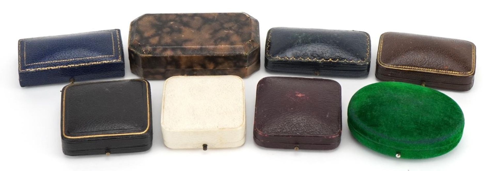 Eight antique and later jewellery boxes including Kendal & Dent London, Henry Jones & Co London, The