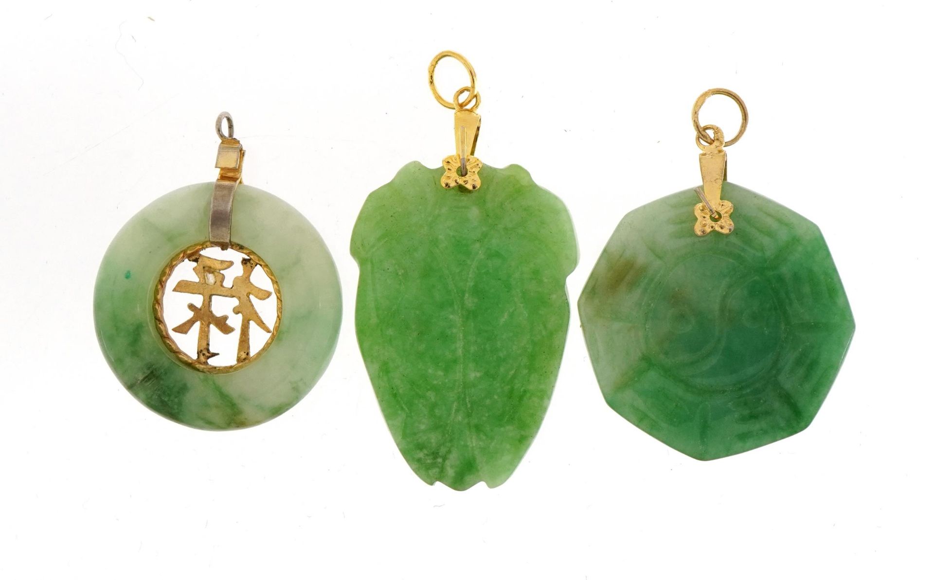 Three Chinese green jade pendants with yellow metal mounts, the largest 4cm high, total weight 20.6g - Image 2 of 2