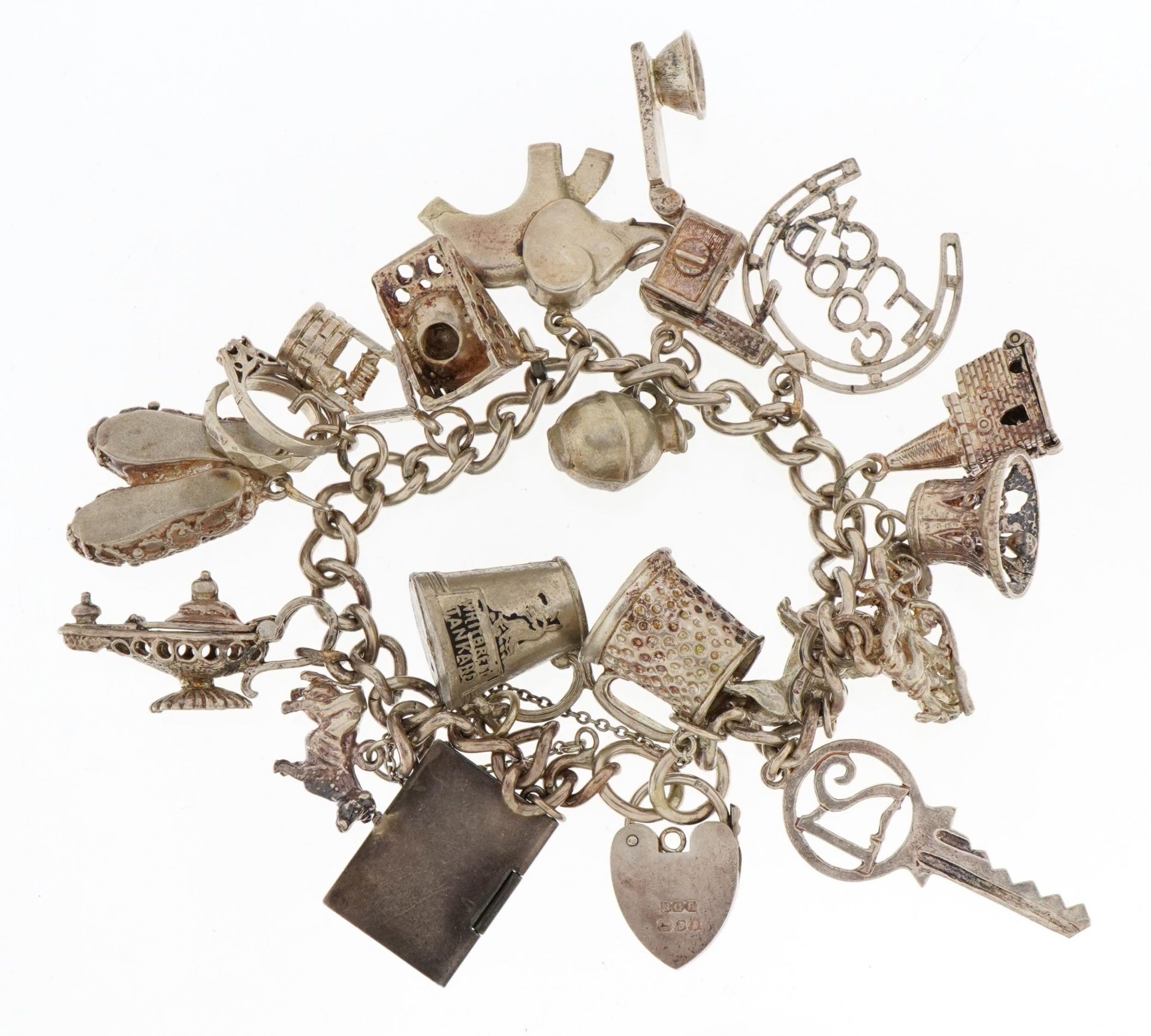 Silver charm bracelet with a selection of mostly silver charms including enamelled mouse and cheese, - Image 2 of 3