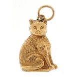 9ct gold seated cat charm, 1.8cm high, 0.7g : For further information on this lot please contact the