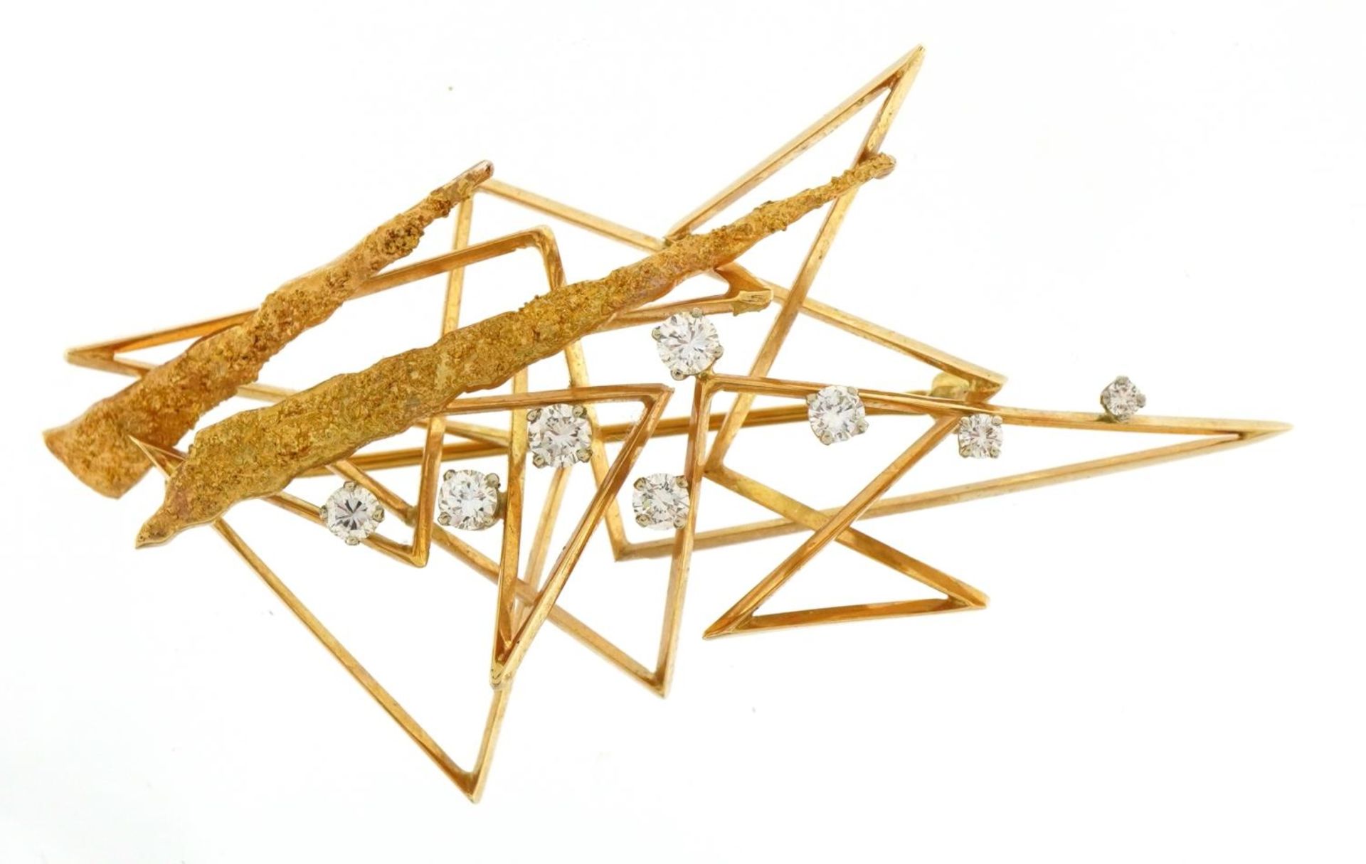 Toni Cavelti Modernist 1960s 18k gold brooch set with eight graduated diamonds, the largest