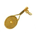 9ct gold tennis racquet and ball charm, 2.5cm high, 1.2g : For further information on this lot