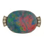 18ct gold mounted opal brooch set with six diamonds, the opal approximately 23.6mm x 18.4mm, 3.0cm