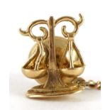 9ct gold weighing scales tie tack with safety chain, 1.4cm high, 4.1g : For further information on