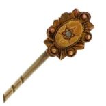 Victorian 15ct gold stickpin set with a diamond, 5.0cm high, 1.1g : For further information on