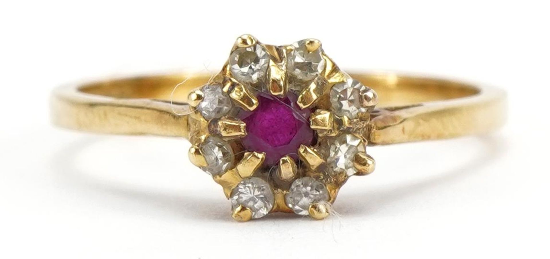 18ct gold ruby and diamond flower head ring, size O/P, 2.7g : For further information on this lot