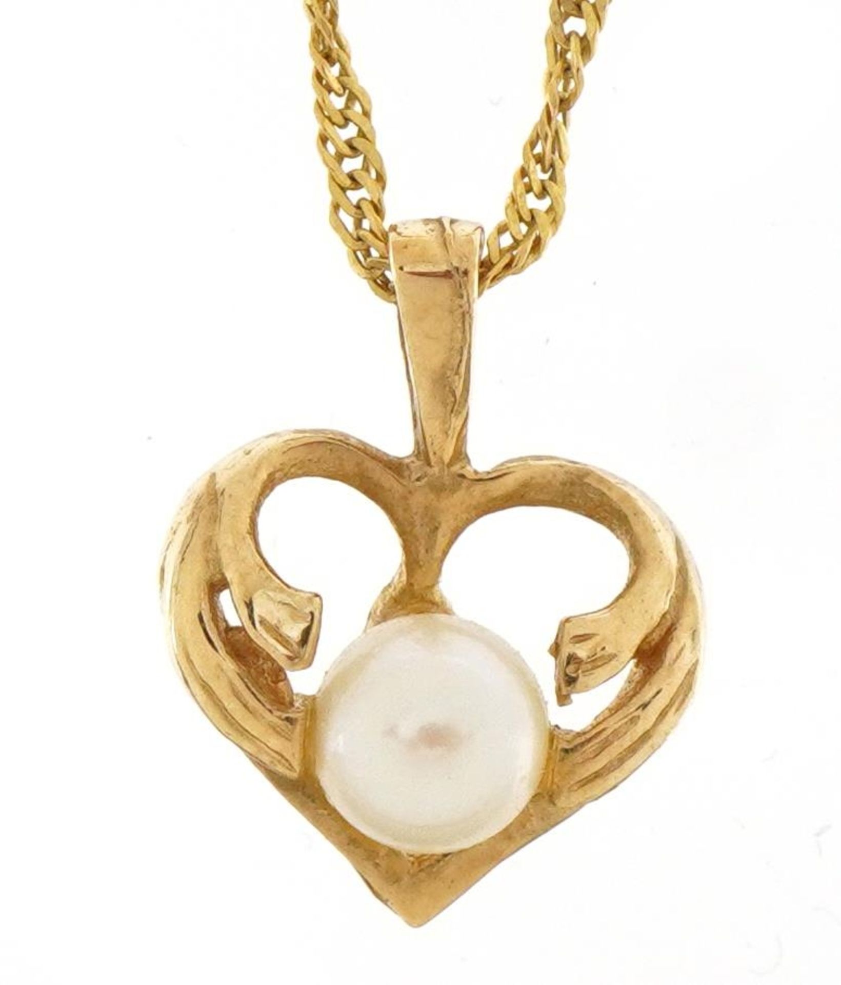 9ct gold love heart pendant set with a pearl on a 9ct gold rope twist necklace, 1.3cm high and