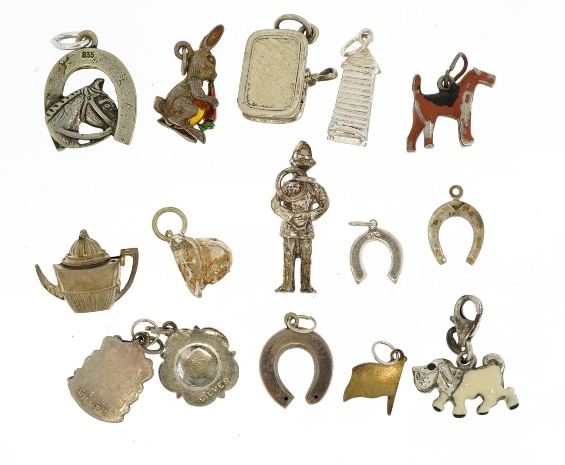 Fifteen silver charms, some enamelled, including Royal Guard in Sentry box, sardine can, dogs and - Image 7 of 7