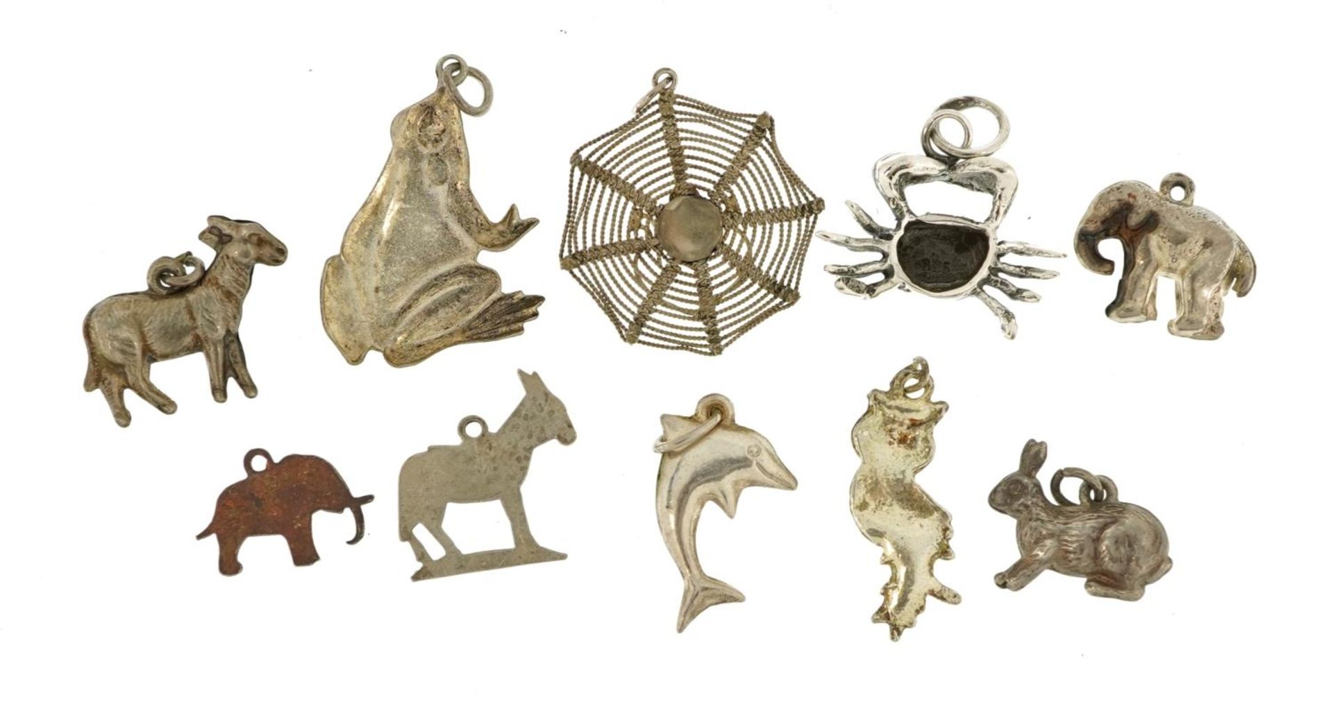 Ten silver and white metal charms and pendants including spider in a web, elephant, frog and hare, - Bild 2 aus 2